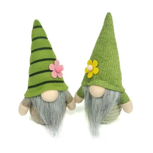 Pair of handmade green St. Patrick's Day plush gnomes for spring holiday table decoration