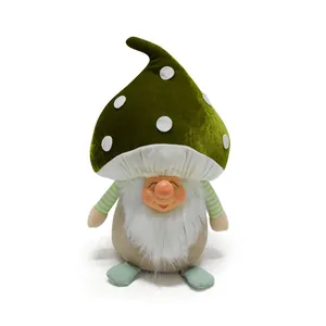 Close-up of a green mushroom cap gnome plush ornament with white polka dots and beard