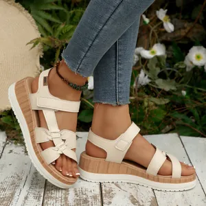 Stylish beige platform wedge sandals with wood grain sole and woven straps for summer
