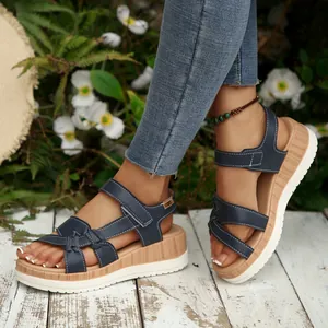 Stylish navy blue women's platform wedge sandals with wood-grain midsole and soft sole
