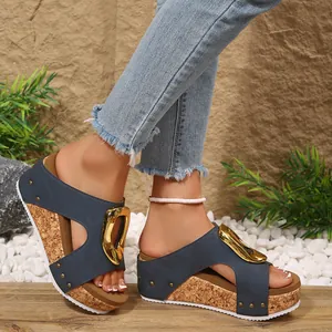 Stylish women's blue wedge sandals with gold buckle and cork platform detail