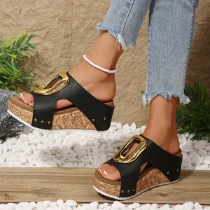 Chic black wedge platform sandals with gold metal buckle and cork textured sole
