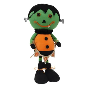 Cute Frankenstein plush doll ornament for Halloween home decoration with 'BOO' banner.
