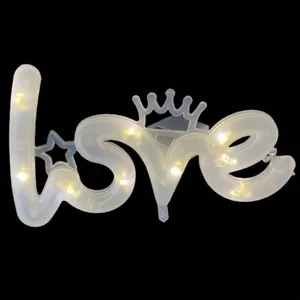 Illuminated white LED 'love' letter light cake topper decoration with crown and star detail