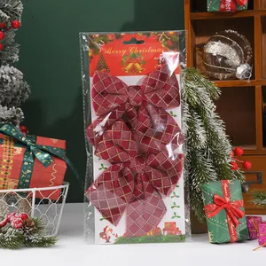Pack of 2 red and gold checkered Christmas bows with festive packaging detail view