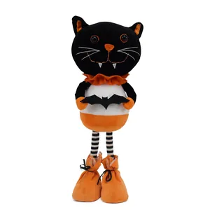 Adorable Halloween black cat plush figurine with striped legs holding a black bat