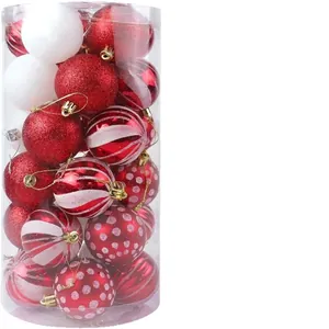 Lindo juego de bolas de Navidad festivas rojas y blancas brillantes en tubo claro