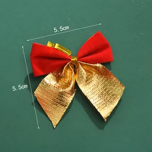 Detailansicht der rot-goldenen Mini-Weihnachtsschleife mit 5,5 cm Bemaßungslinien