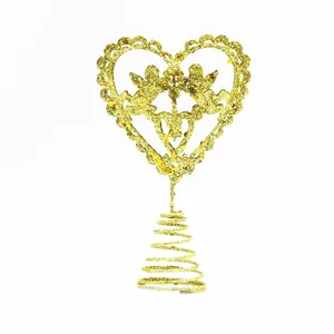 Detailed view of a glittery gold heart-shaped Christmas tree topper with angels