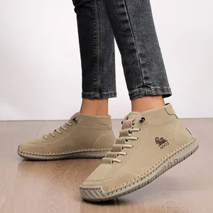 Hand-stitched khaki flat ankle boots with lace-up closure for autumn winter casual wear