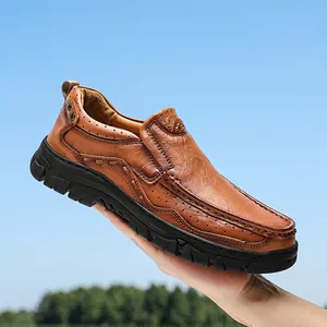 Brown leather men's outdoor casual shoe with textured finish and rubber sole