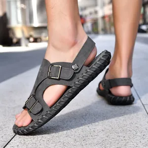 Close-up side view of men's casual outdoor grey sandals with soft non-slip soles.