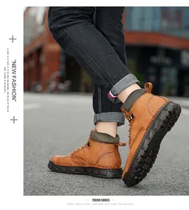 Stylish brown leather ankle boots for men with thick slip-resistant soles.