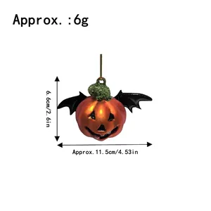 Decorazione sospesa di zucca Halloween con ali di pipistrello e viso di fantasma