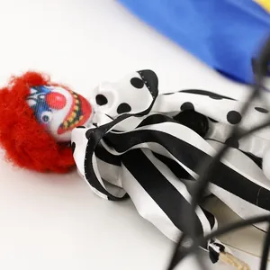 Horror clown doll for Halloween party decoration with red hair and striped satin suit