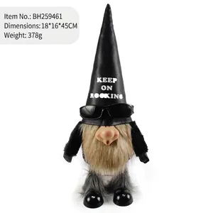 Detailed view of a rock-style gnome plush doll with sunglasses and black pointed hat