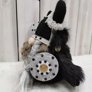 Detail view of handmade Viking warrior gnome with black fur and shield