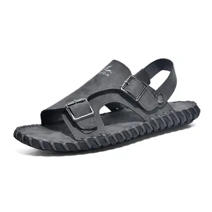 Detail view of men's grey casual buckle sandal with non-slip sole and Walkin logo