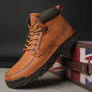 Classic British style men's tan leather Martin boots with thick patterned rubber sole
