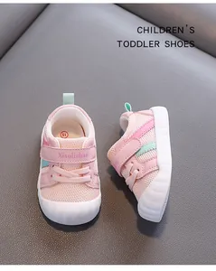 Detailed top and side view of pink breathable mesh toddler walking shoes with soft soles