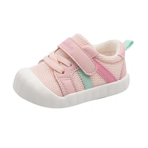 Breathable pink and mint green mesh baby walking shoes with soft non-slip white rubber sole