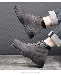Seitenansicht graue Wildleder-Stiefel mit robuster Gummisohle und stilvollem Schnürdesign
