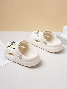 Cream-colored casual clog shoes with cute astronaut and star charms
