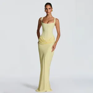 Front view of an elegant light yellow square neck maxi dress with corset-style bodice