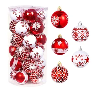 Detailansicht von 30 rot-weißen Weihnachtskugeln mit festlichen Mustern im Set.