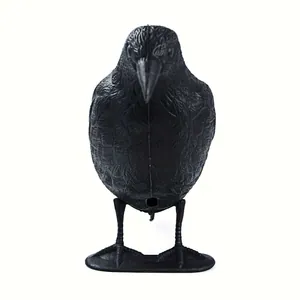 Front view of realistic black crow decoy bird deterrent for garden ornament and hunting
