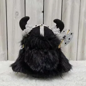 Handmade Viking warrior gnome plush with black horned helmet and decorative felt axe.