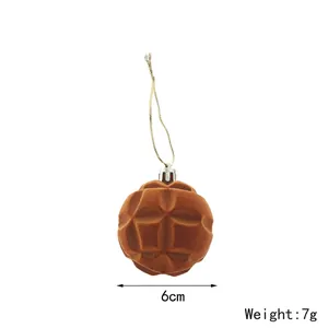 Detail view of 6cm brown flocked Christmas ball ornament pendant showing 7g weight