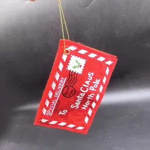 Red Christmas felt envelope ornament for hanging on trees as a candy bag.