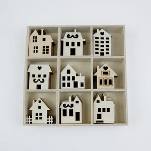 Detailed view of nine unique wooden house-shaped DIY craft decorations in a grid box.
