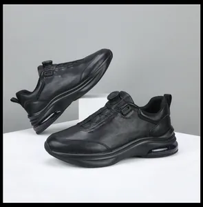 Premium black leather men's casual sneakers featuring rotary buckle and air cushion sole
