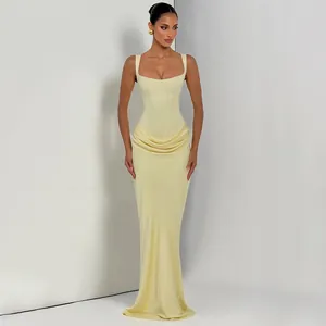 Elegant pale yellow slim-fit corset maxi dress with square neckline and draped skirt