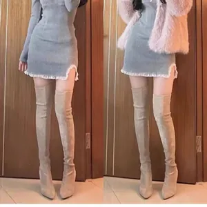 Side-by-side view of beige suede over-the-knee boots with pointed toe and chunky heels