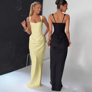 Detailed front and back views of square neck corset waist satin maxi dress in yellow and black
