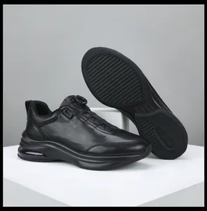 Macro view of black leather men's sneakers featuring a rotating buckle and air cushion sole