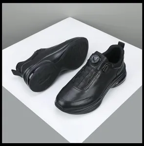 Black premium leather men's sneakers featuring a rotary buckle closure and thick soles.