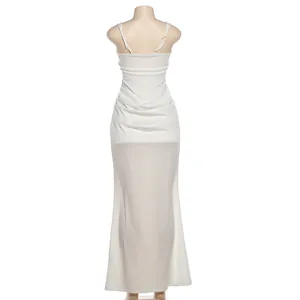 Elegant back view of solid white slim fit backless strap maxi dress on a mannequin