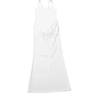 Detailed view of a white slim-fit maxi dress featuring elegant waist drapes and square neck
