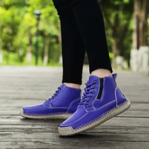 Side view of purple handmade stitched Martin boots with a practical side zipper design