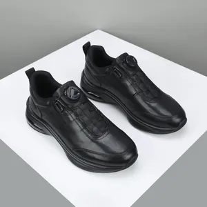 Premium black leather men's casual sneakers with rotary buckle and thick cushioned sole