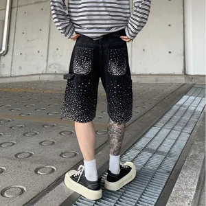 Trendy men's loose straight black denim shorts with sparkling rhinestone studs and cargo pockets