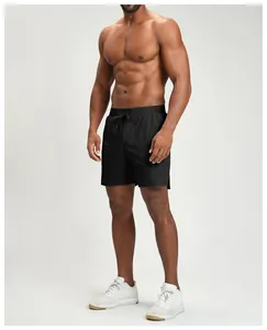 Detail of breathable black quick-dry athletic shorts with adjustable drawstring waist