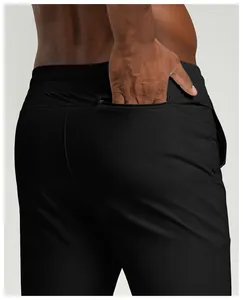 Detail shot of men's quick-dry sports joggers featuring a secure back zipper pocket