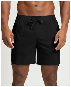 Detail of men's quick-dry black athletic shorts showing drawstring and fabric texture