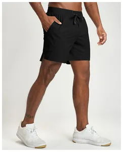 Men's black quick-dry sports shorts for gym fitness and running training in side view