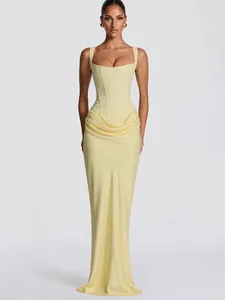 Elegant butter yellow square-neck bodycon maxi dress with draped waist detail and corset